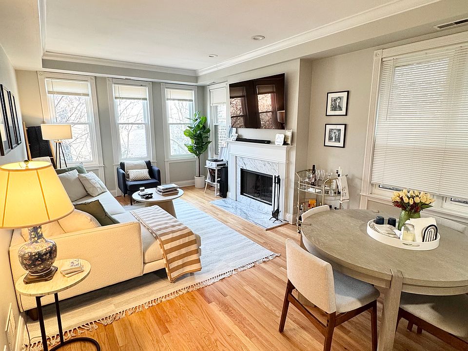 Hardwood flooring, wood-burning fireplace, crown molding 9 foot ceilings.