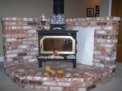 Energy efficient wood stove, & dual pane, celing fans thruout.
