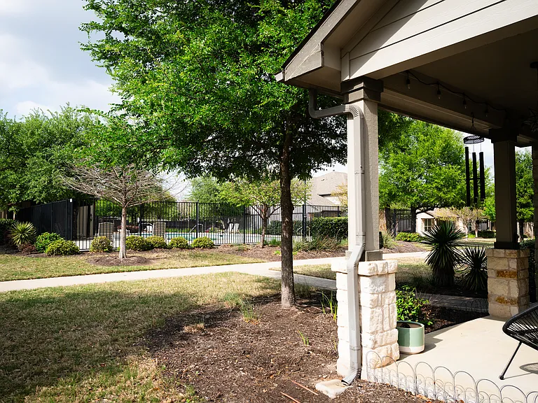 Enjoy all of the perks of a serene pool right across from your front door, with zero maintenance.