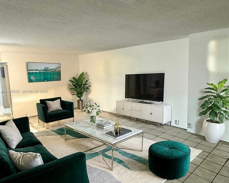 1st image of 920 NE 199th St #309-3J