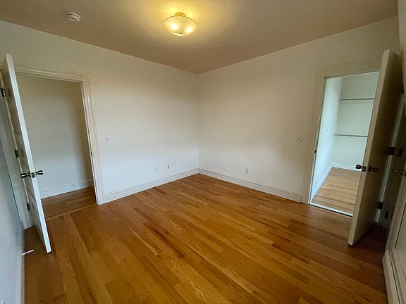 Bedroom with walk-in closet