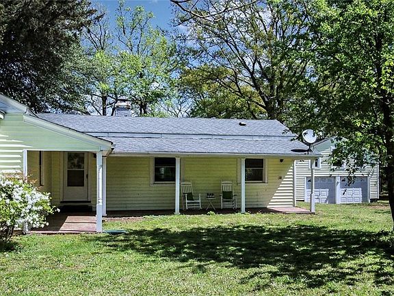 Spacious Ranch with new ductwork, updated electrical panel box, and new carpeting. Add'l features: Sun Room, wood burning fireplace, oversized 2 car detached garage, Front Porch, and Deck.
