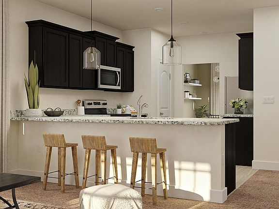 This spacious kitchen features plenty of storage in the gorgeous high-grade cabinets.