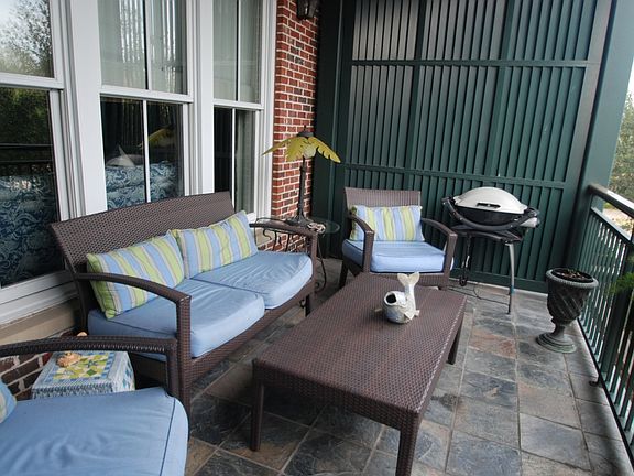 Covered terrace overlooking park