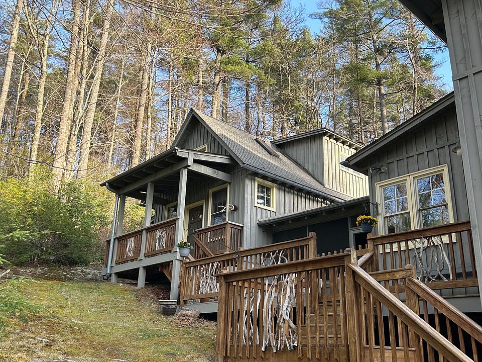 Side of home with view of Guest House