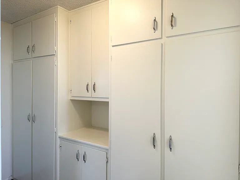 Interior hallway storage. Linen closet and coat closet