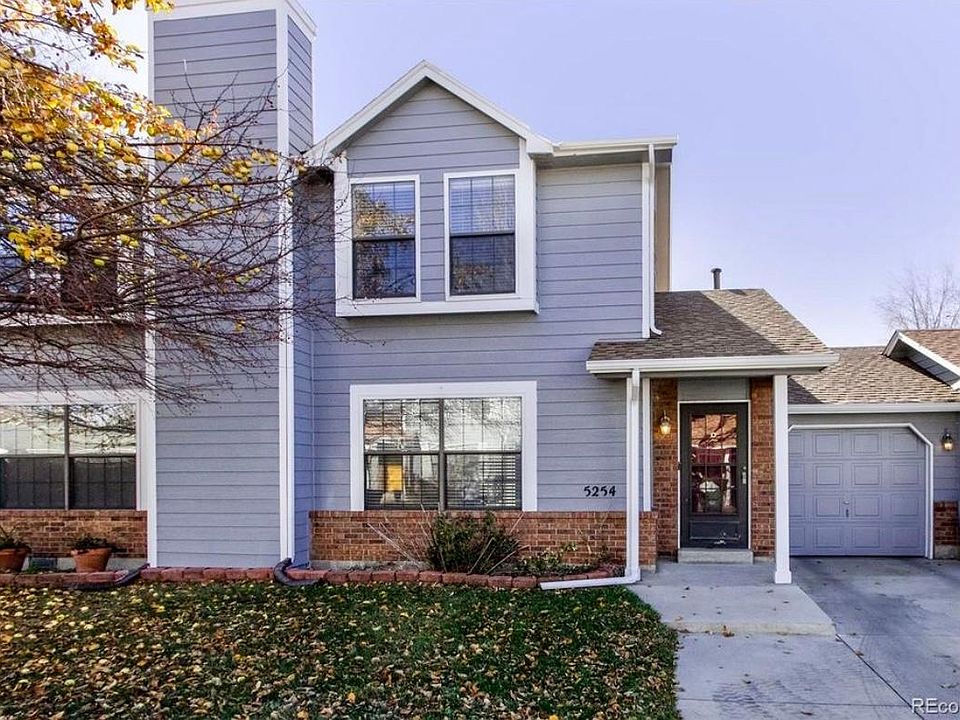 Updated Townhome with attached 1 car garage.