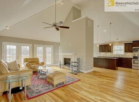 The Great Room is DRAMATIC with soaring ceilings, open floor pla