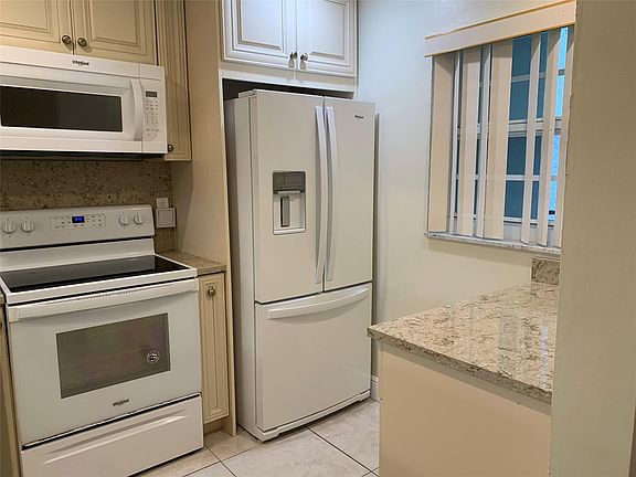 5th image of 9460 Poinciana Place #203