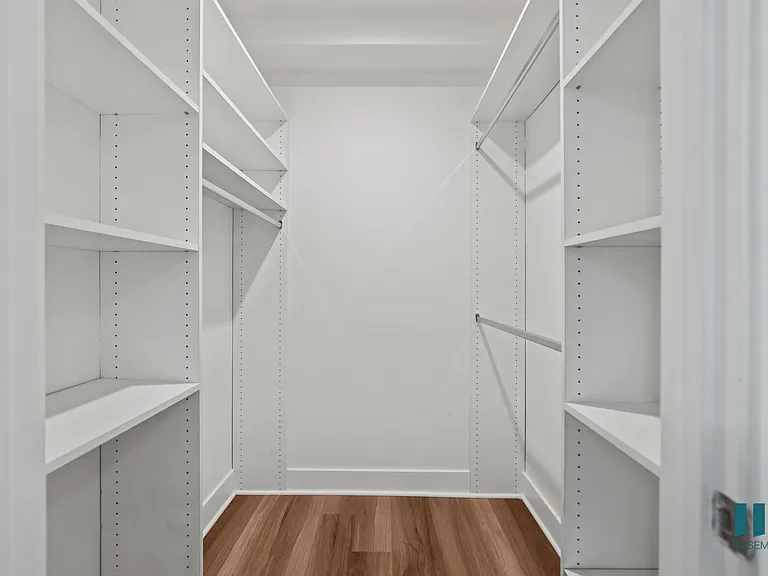 Walk-In Closet with Built-In Shelving