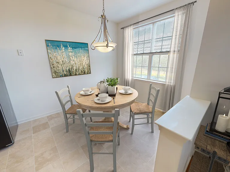 Welcome to Eastampton Village Center, where modern living meets comfort. This inviting dining area is perfect for gatherings, featuring natural light and stylish decor. Make this your new home today! Schedule your tour now.