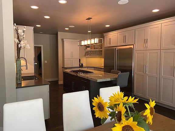 Looking toward Kitchen with Large Island / Gas Cook Top / Double Ovens Full size All Fridge / Full Size All Freezer
