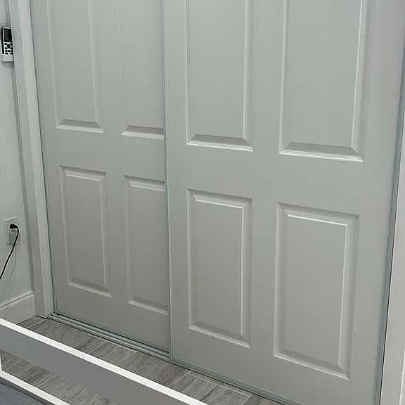 Generous closet for organized storage of clothes and items.