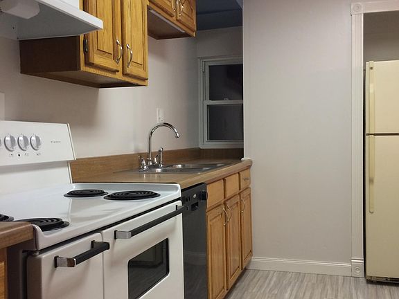 Light grays and blues go with every decor. Under cabinetry lighting. Plenty of overhead lighting, too.
