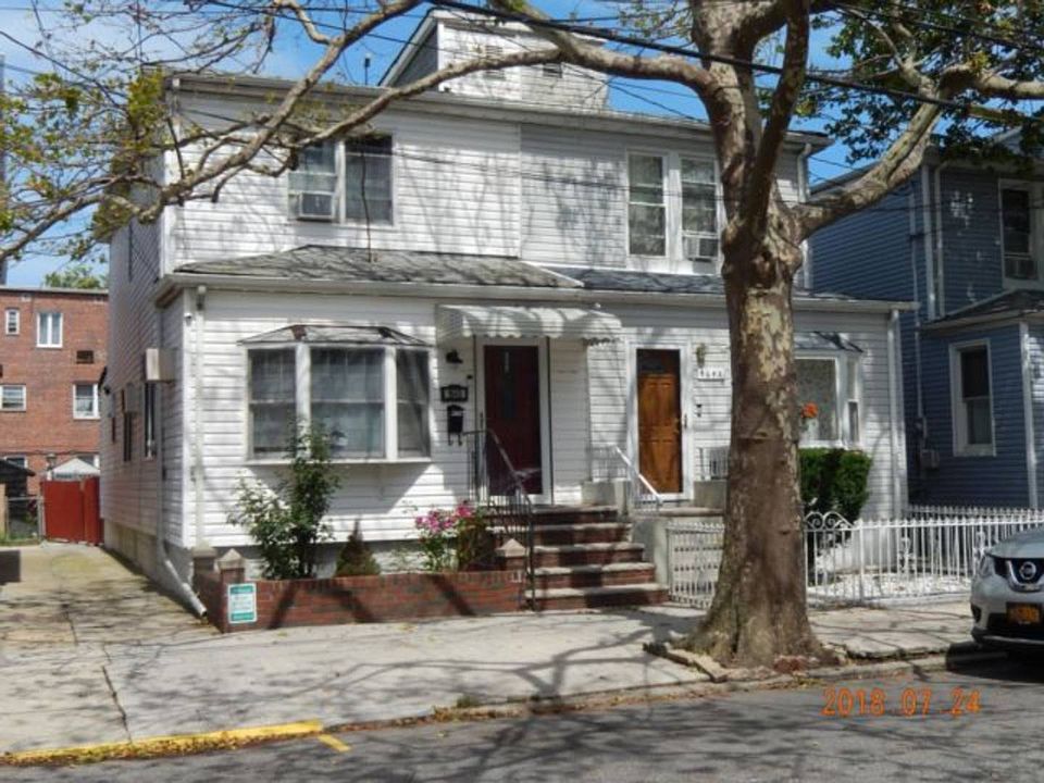 1st image of 1643 E 92nd St