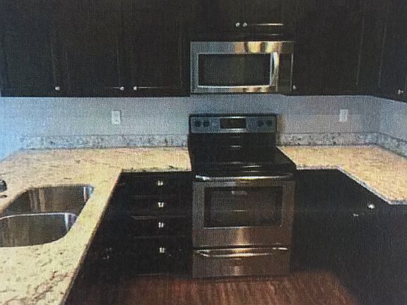 2nd image of 713 Courage Ct SE