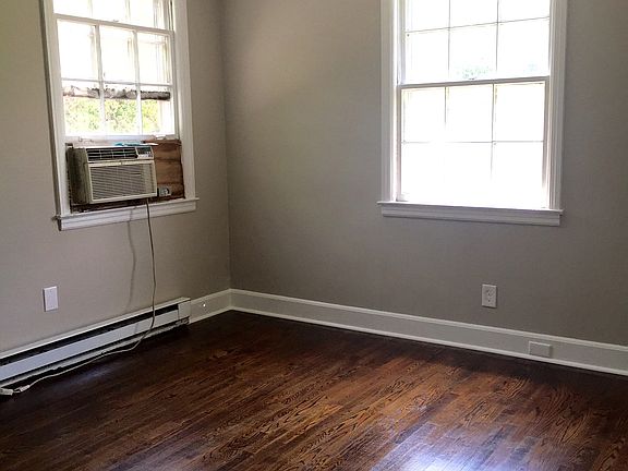 Fresh paint can be seen throughout with beautiful hardwood f