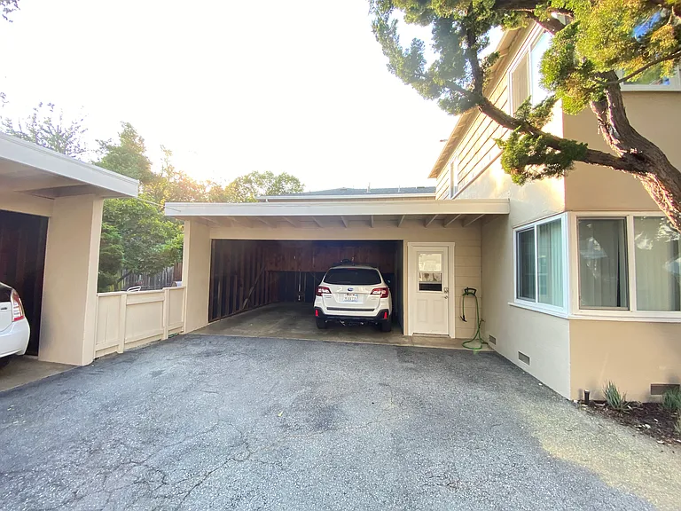 One parking space is available for each unit. The laundry room is next to the parking garage.