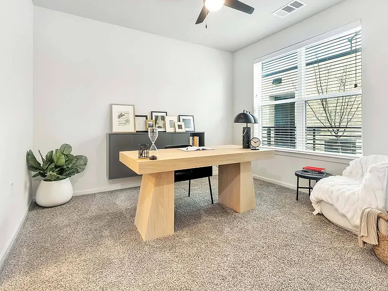 Work from home in comfort with a bright and spacious home office, designed for productivity.