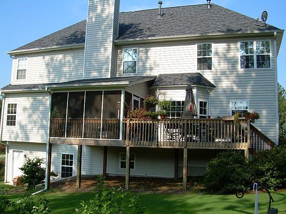 Screened Porch, Deck, Sodded and Private Backyard