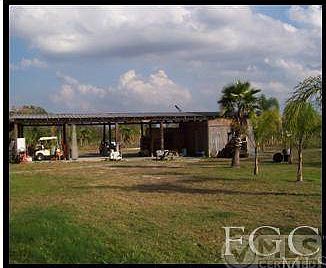 Pole barn with cement floor.