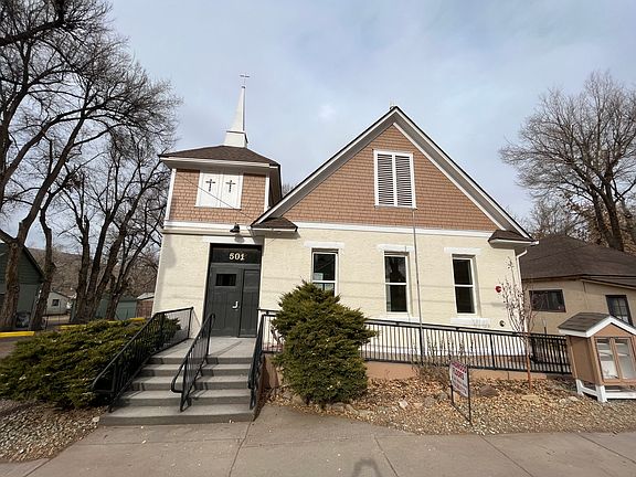 This apartment unit shares a front entrance with one other unit (there also is one unit in the back and one in the basement). The first bedroom has a view from the front two windows on the right.