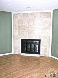 Wood Burning Fireplace located in Dining Room