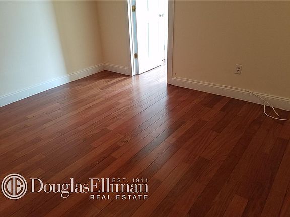 3rd image of 111 E 7th St APT 55
