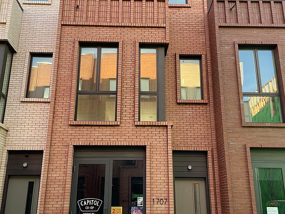 1707 Spoke St - 1st Floor Capitol Co-Op Bicycle Shop. 2nd/3rd floor single residential unit with 2 BR, 1.5 bath, dedicated entrances off front and back and back privacy deck with views to the north.