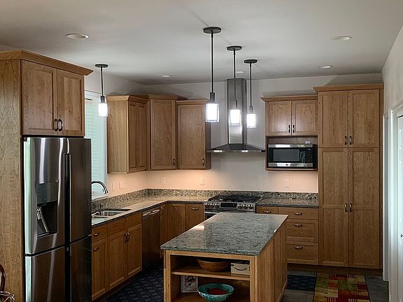 Cherry cabs; quartz counters