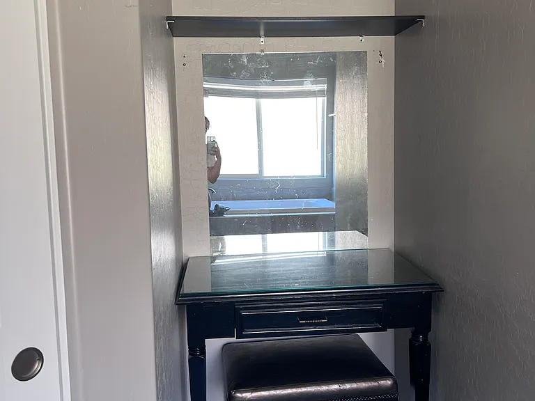 Vanity with shelvings.