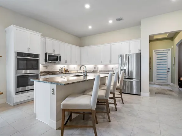 8318 W Blue Spring Drive, Parkland, FL 33067