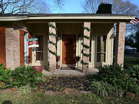 Front doorway and porch inviting you inside.