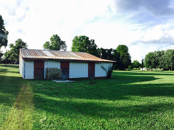 Three horse stalls in rear