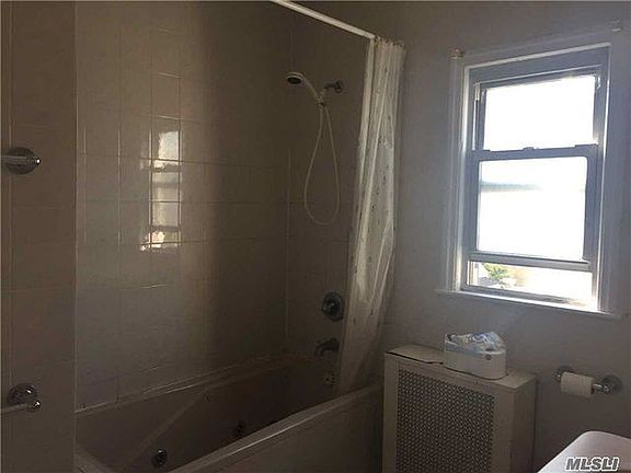 2nd image of 211-15 56th Ave Unit 1