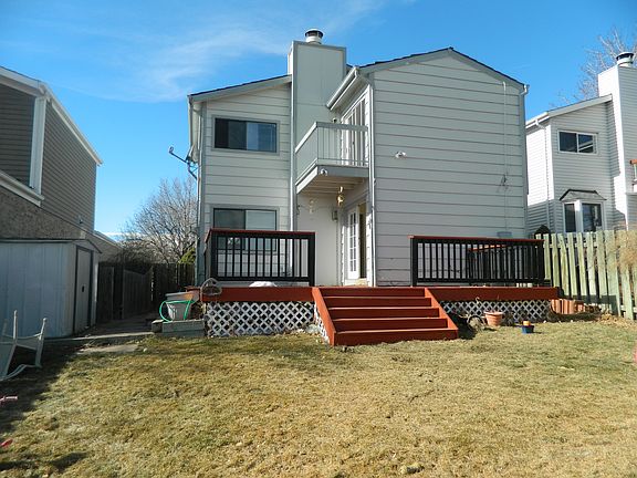 large yard backs to park, large deck