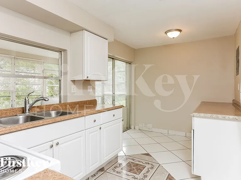 6891 NW 25th Ct — Photo 8
