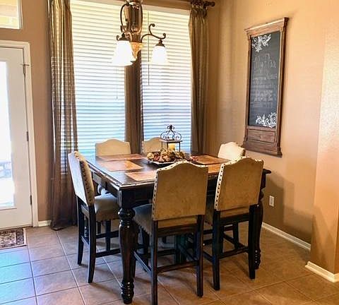 Dining, entrance to covered back patio.
