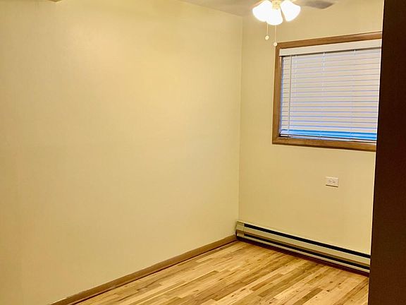 Dining room space with ceiling fan