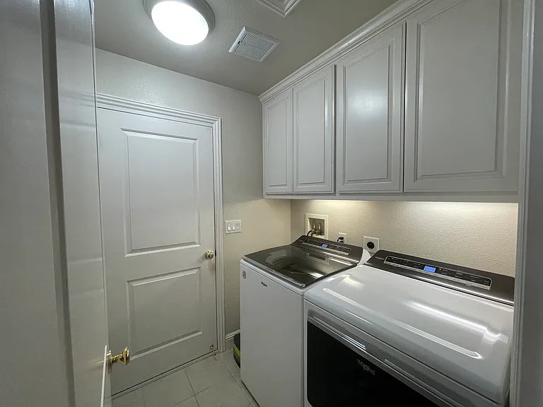 Laundry Room - High-efficiency, ultra-quiet laundry center engineered to effortlessly handle a busy household's needs.