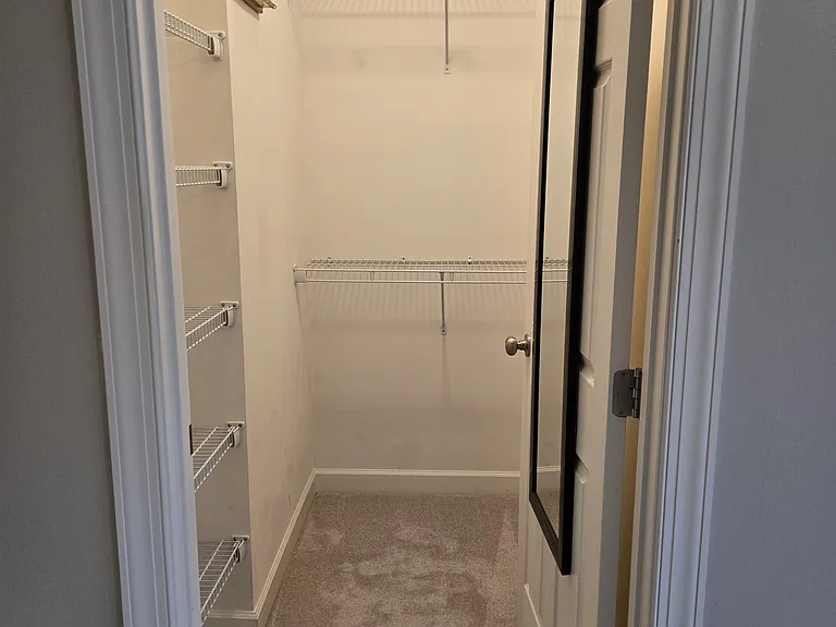 1 of 2 walk in closets in Primary