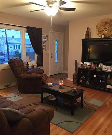 Bright Living Room with Har...