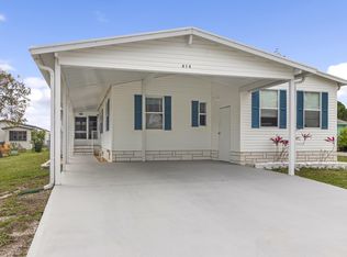 414 Egret Cir, Barefoot Bay, FL 32976
