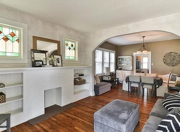 As soon as you enter the home, you are greeted by a charming living room and dining room. Decorative