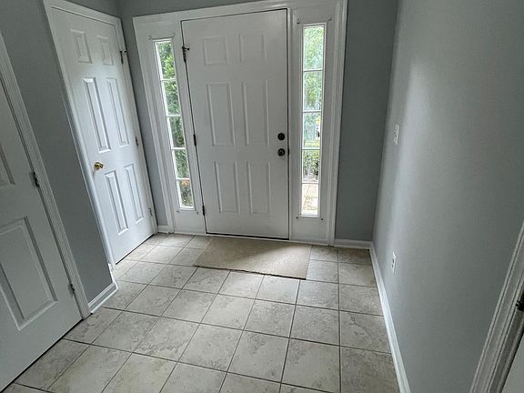 Entrance Foyer with closet and half bath