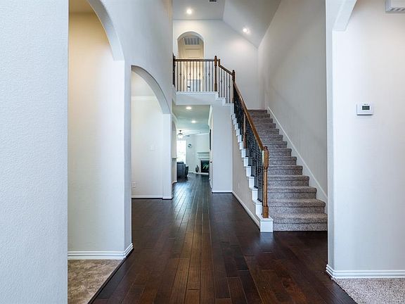 Upon entering the home you see beautiful hardwood floors that extend throughout the foyer, dining, and living room!