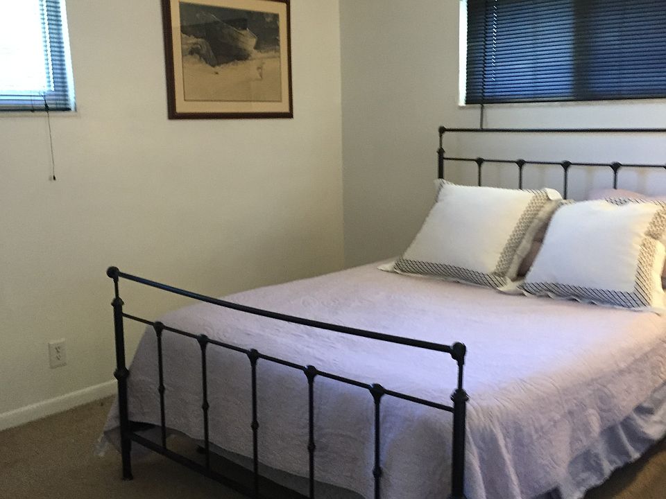 Bedroom does not come with furnishings. Old photo, there is a new fan. Bedroom has impact/hurricane glass and is quiet