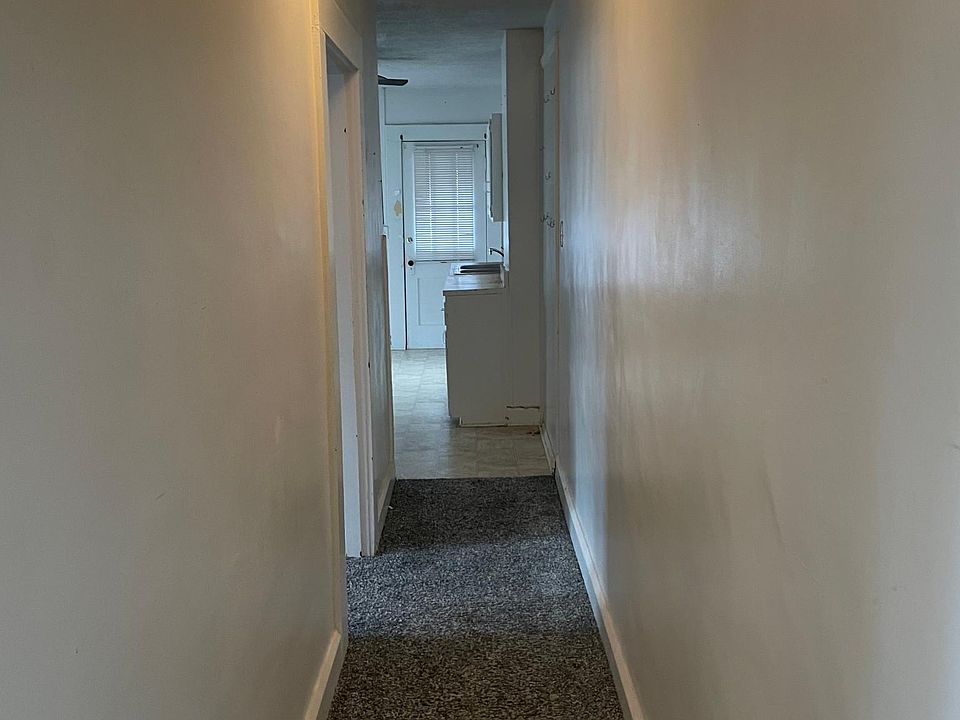 Hall to bedroom and kitchen