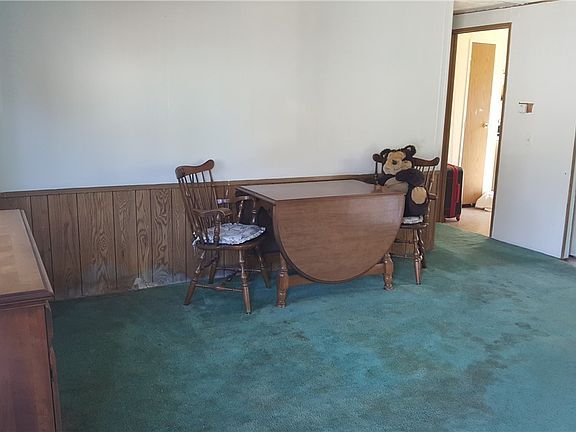 Other side of living room. Maybe dining area?