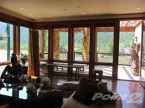 Open sunny living room and terrace